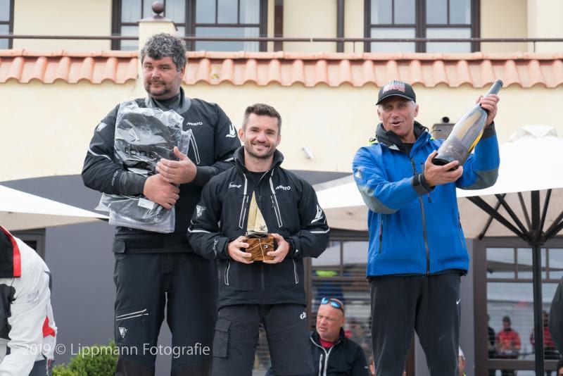 Dmitry Samokhin, Andrey Kirilyuk and Aleksey Bushuev win the 2019 Dragon Grand Prix Germany photo copyright Lippmann Fotografie taken at  and featuring the Dragon class