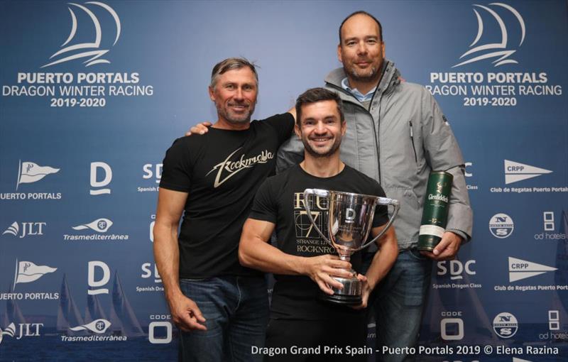 Dmitry Samokhin (c), Andrey Kirilyuk (l) and Kasper Harsberg (r) - winners of the 2019 Dragon Grand Prix Series with the spectacular new Standfast Trophy presented by Grant Gordon and Klaus Diederichs photo copyright Elena Razina taken at  and featuring the Dragon class