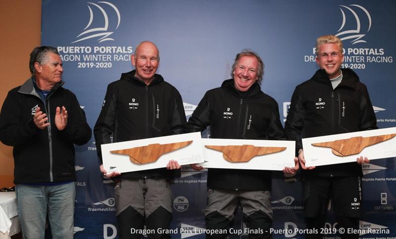 L to R - Race Officer Nino Schmueli presents Martin Palsson, Thomas Wallenfeldt and Gustav Garedeback win the Corinthian Dragon Grand Prix European Cup Finals photo copyright Elena Razina taken at  and featuring the Dragon class