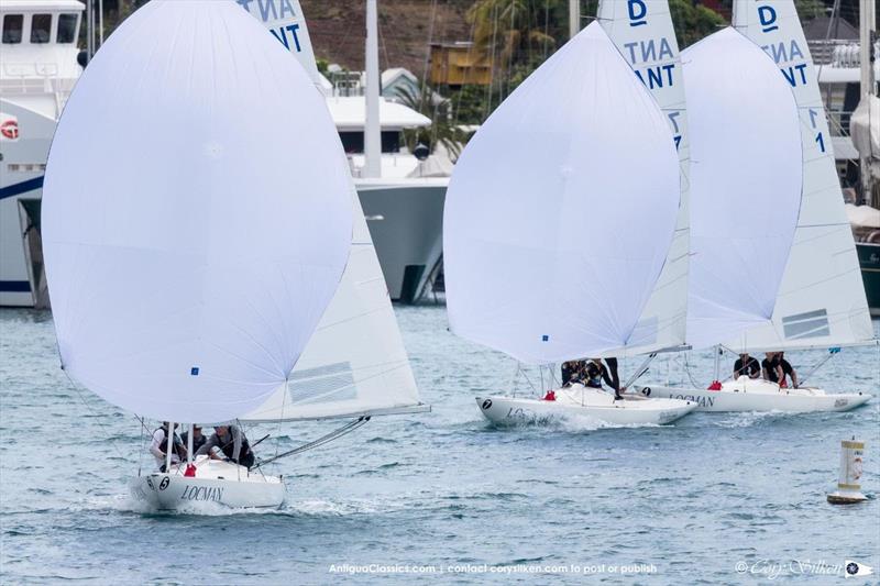 The Dragon class setting their spinnakers in Falmouth Bay - Antigua Classic Yacht Regatta - photo © Cory Silken