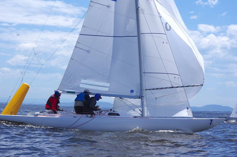 Karabos IX rounds the windward mark, with her crew raising the spinnaker - 2024 International Dragon Class Prince Philip Cup day 1 - photo © Jeanette Severs