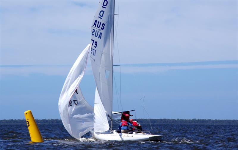 The crew on Imagination work hard to raise the spinnaker photo copyright Jeanette Severs taken at Metung Yacht Club and featuring the Dragon class