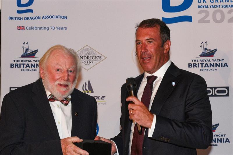 86 years young Ron James (L) receiving a special award from British Dragon Association Chairman Chris Grosscurth in recognition of 30 years of support and service to the Dragon class - photo © Rick Tomlinson