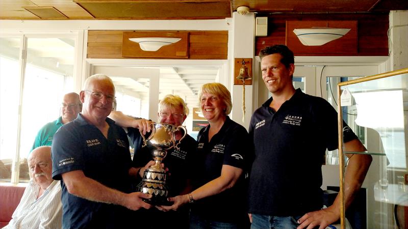 Brave crew celebrate winning the EAORA Houghton Cup (l-r) Richard Brown, Cathy Brown, Claire Scott, Pete Edmunds photo copyright Laura Ivermee taken at Royal Corinthian Yacht Club, Burnham and featuring the EAORA class