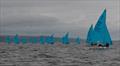The fleet sailing on day 3 of the Enterprise Nationals at Tenby © Alistair Mackay