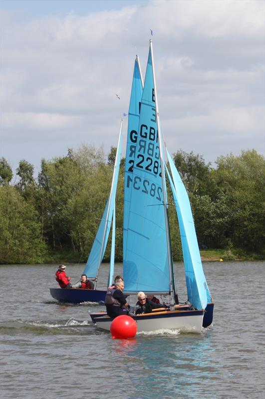 Mike Cossey and Margot Bish round a mark on the inside of Paul Young and Oliver Maclean in race 3 of the Tamworth Enterprise Open photo copyright Andy Backhouse taken at  and featuring the Enterprise class