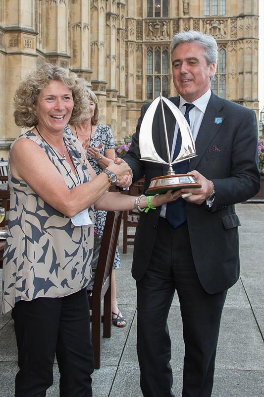 Enterprise Class Association PRO Alice Driscoll presents trophy to Mark Garnier MP of House of Commons Sailing Club photo copyright Tim Hodges taken at House of Commons Sailing Club and featuring the Enterprise class