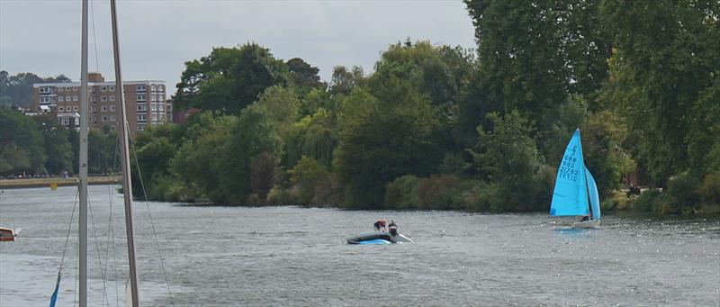 Over and out: Minima Commodore John Forbes retired after righting his Enterprise with crew Andy Cuckson, at extreme left is the upturned stern of John Wilkey's Solo, upended by the same gust, at right Twickenham's Ed Skinner at the Minima Regatta - photo © John Forbes & Alastair Banks