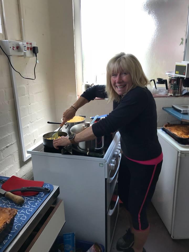 The commodore Sue Stewart cooking lunch during the Earlswood Lakes Enterprise Open photo copyright Perry Clarke taken at Earlswood Lakes Sailing Club and featuring the Enterprise class