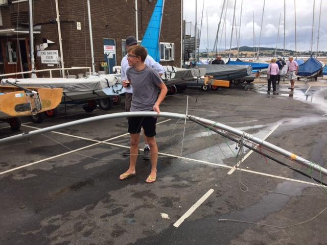 Lloyd Williams with his bent mast as a result of hitting the sand bar on day 2 of the Enterprise Nationals at Exe - photo © Alice Driscoll