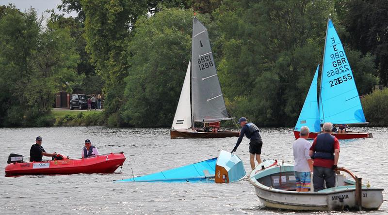 Rob Brignell (Twickenham) got his Ent back up in the final race at the Minima Regatta 2022, but sadly had to retire. Merlin 1288 is class winner Nick Armfield's, Enterprise 22655 is Richard Shillito of Minima photo copyright Rehanna Neky taken at Minima Yacht Club and featuring the Enterprise class