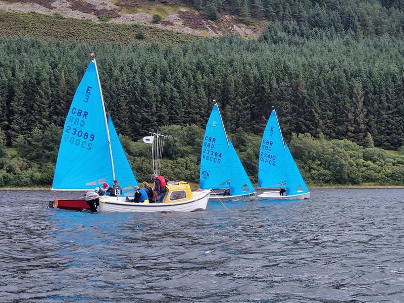  Ges Brown & Julie Moore crossing the Race 5 finish line ahead Of Tim Sadler & Clarissa and Charles Morrish & Luke Hartshorn during the Enterprise Scottish Championship & UK Masters Championship at St Mary's Loch photo copyright Katie Masterton taken at St Mary's Loch Sailing Club and featuring the Enterprise class