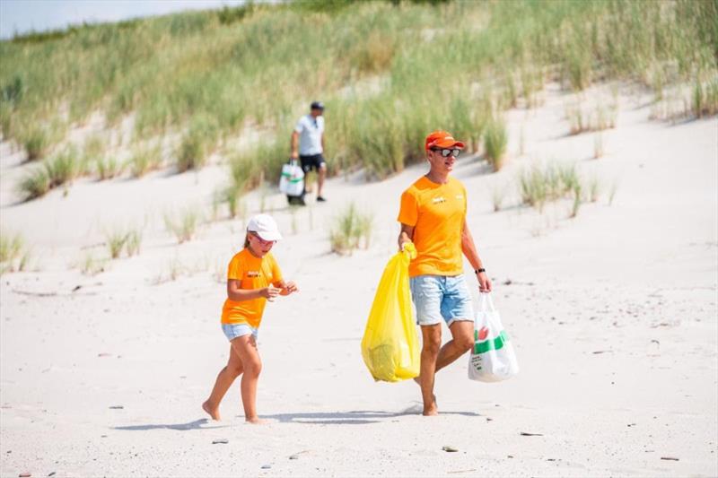 Beach Cleanup photo copyright Domas Rimeika taken at  and featuring the Environment class