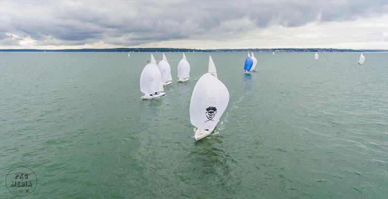 Jolly Roger leading the fleet during the Etchells Saida Cup photo copyright PKC Media taken at Royal Thames Yacht Club and featuring the Etchells class