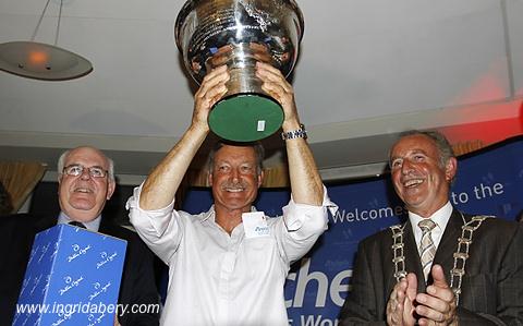 John Bertrand, Tom Slingsby and Andrew Palfry win the 2010 Etchells worlds title photo copyright Ingrid Abery / www.hotcapers.com taken at Howth Yacht Club and featuring the Etchells class