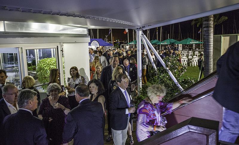 Guests arriving into the ballroom, after pre-dinner drinks on the wonderful lawn on a balmy night photo copyright John Curnow taken at Royal Queensland Yacht Squadron and featuring the Etchells class
