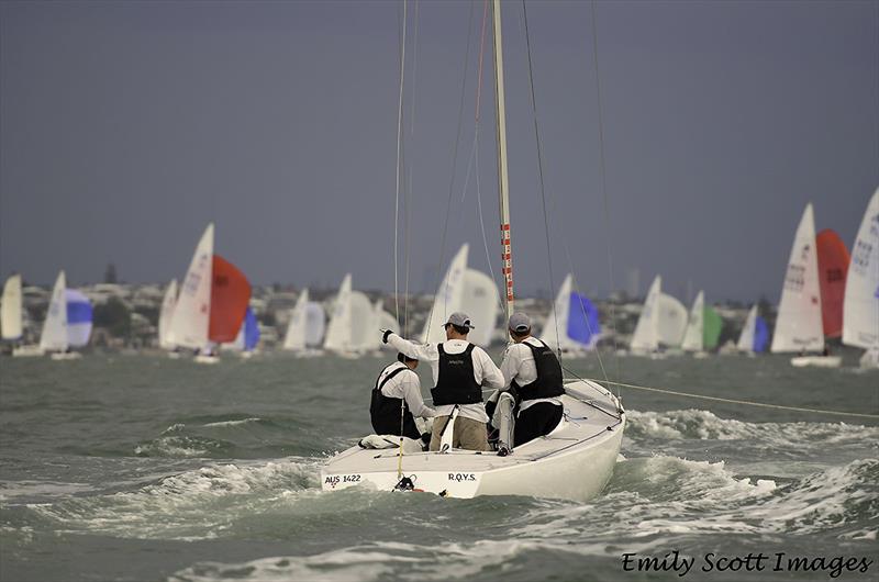 Heading home under tow is local boat, Land Rat, AUS 1422, John Warlow, Todd Anderson and Curtis Skinner - 2018 Etchells World Championship photo copyright Emily Scott Images taken at Royal Queensland Yacht Squadron and featuring the Etchells class