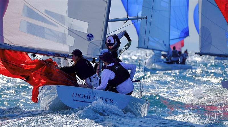 Highlander (Martin Webster, Robbie Gibbs, Will Boulden and Zoe Thomson) on the run to the leeward gate photo copyright Mitchell Pearson / SurfSailKite taken at Royal Queensland Yacht Squadron and featuring the Etchells class