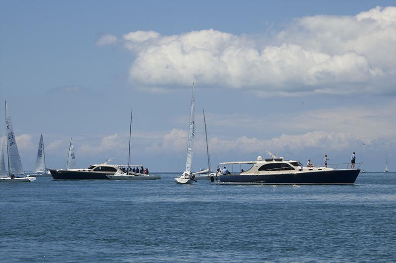 Crews return to their craft from their Palm Beach Motherships as the breeze finally kicks in at the 2018 Etchells World Championship photo copyright John Curnow taken at Royal Queensland Yacht Squadron and featuring the Etchells class