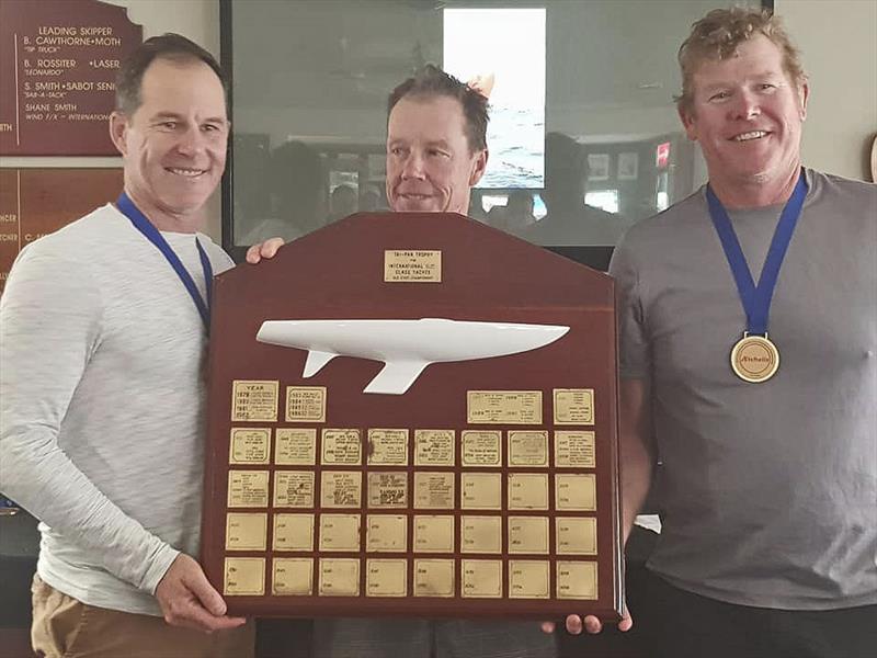 David Clark, Alan Smith, and Andrew Smith collect the silverware photo copyright Southport Yacht Club taken at  and featuring the Etchells class