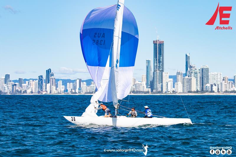 Emotional Rescue in front of Surfers Paradise photo copyright Nic Douglass @sailorgirlhq taken at Southport Yacht Club and featuring the Etchells class