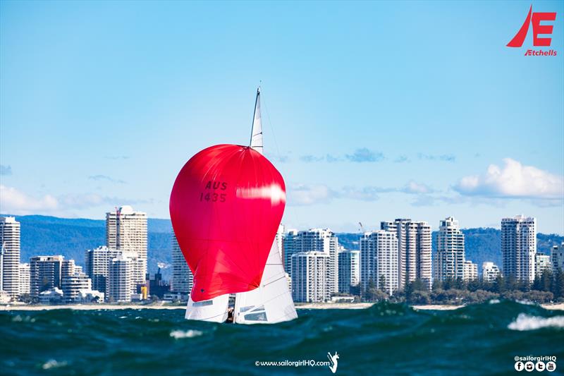 Flying High behind a swell - 2022 Gold Coast and Australasian Etchells Championship photo copyright Nic Douglass @sailorgirlhq taken at Southport Yacht Club and featuring the Etchells class