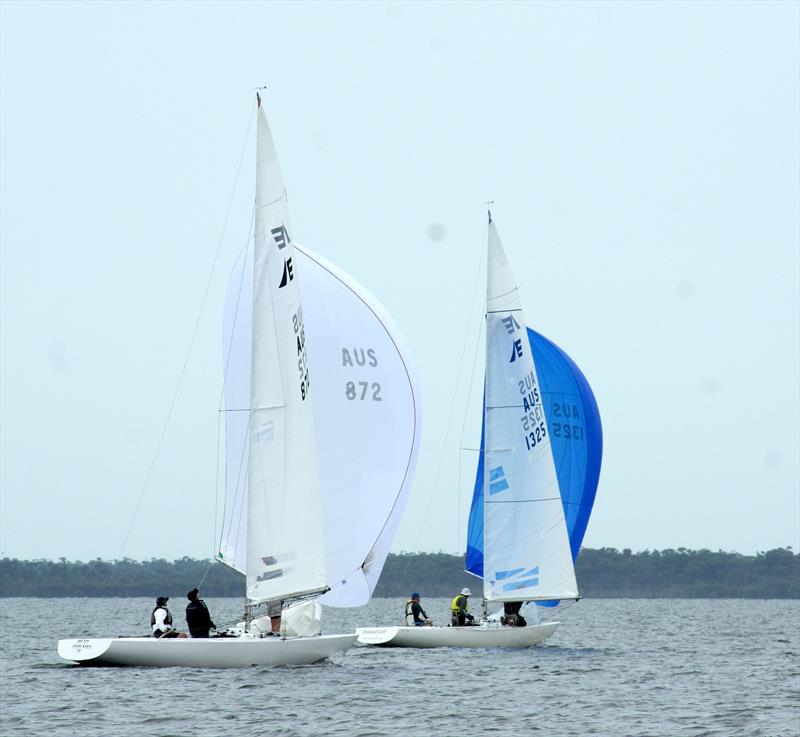 Count Boris’s Secret Rendezvous and Ireland Girl, with kites up, compete for wind on the final leg of race seven photo copyright Jeanette Severs taken at Metung Yacht Club and featuring the Etchells class