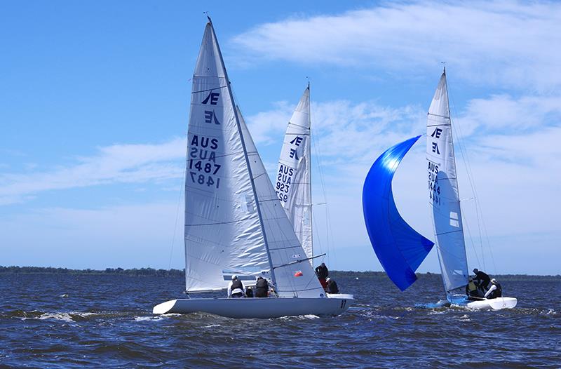 Jindavik (AUS1487) and Playing Around 3 (AUS1444) follows Apres La Mer (AUS923) around the windward gate in race one on Lake King at Metung - Etchells Victorian Championship 2024 - photo © Jeanette Severs