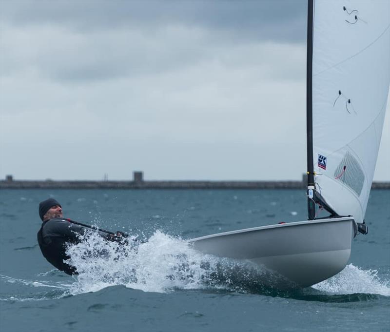 Steve Cockerill mastering windy weather sailing on Day 1 at the 2021 UK Europe National Championships photo copyright Linus Etchingham taken at Weymouth & Portland Sailing Academy and featuring the Europe class