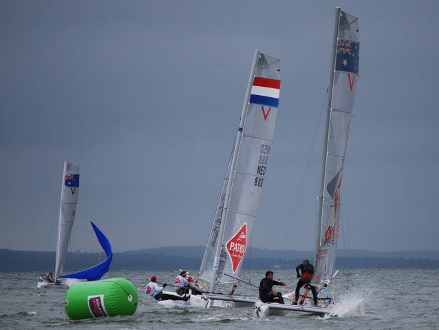 Darren Bundock/Celine Van Dooren followed by Jason Waterhouse/Brett Goodall at the F16 Worlds day 1 photo copyright Michel Espaingnet taken at  and featuring the Formula 16 class