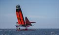 The China SailGP F50 catamaran leans over at an extreme angle during practice in San Francisco Bay. Race 2 Season 1 SailGP event in San Francisco 25 April 