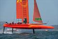Team China foil a high and crash resulting in a damaged wing. Practice race day, Event 2, Season 1 SailGP event in San Francisco, 