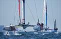 Canada SailGP Team sail past Great Britain SailGP Team on Race Day 2  - T-Mobile United States Sail Grand Prix, Chicago at Navy Pier, Lake Michigan, Season 3 © Bob Martin/SailGP