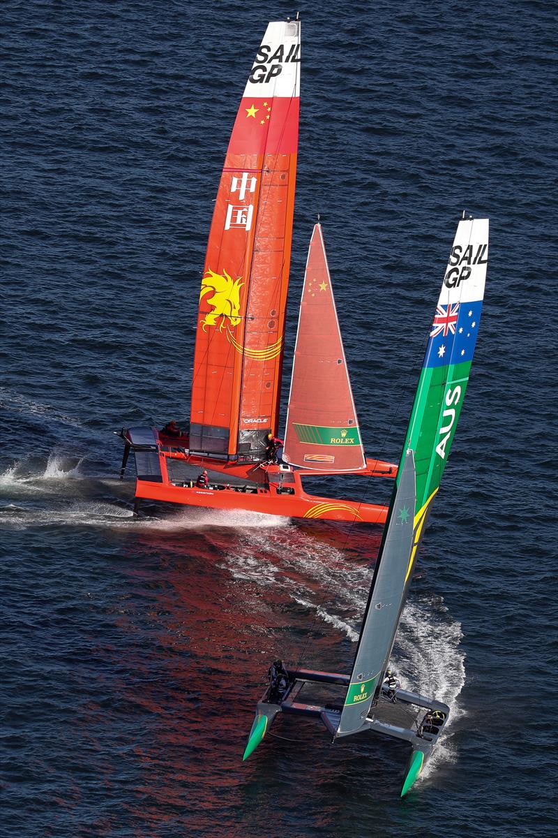 Australia SAILGP Team skippered by Tom Slingsby crosses China SailGP Team skippered by Phil Robertson in race 3 on day 1 of SailGP Sydney photo copyright David Gray / SailGP taken at  and featuring the F50 class