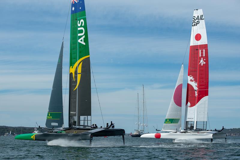 Australia SailGP Team skippered by Tom Slingsby overtakes Japan SailGP Team skippered by Nathan Outteridge leads during Race Four at the Sydney SailGP - photo © Chris Cameron / SailGP