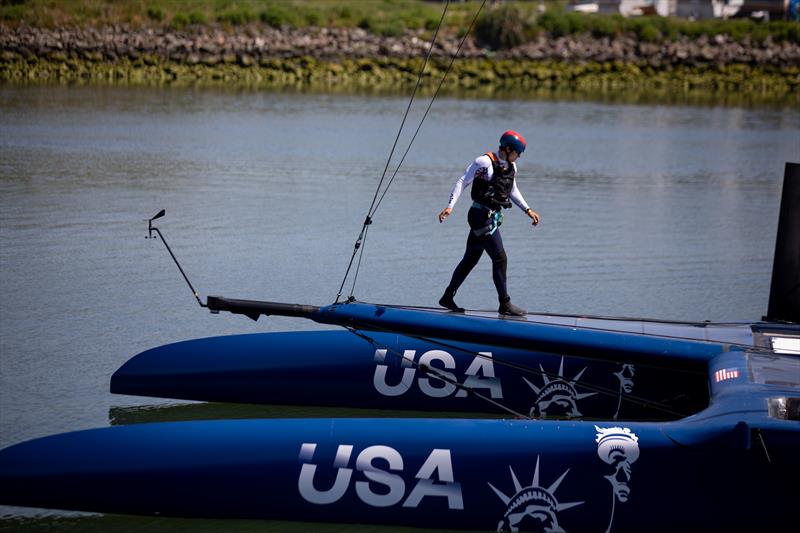A member of the crew makes the United States SailGP Team F50 catamaran ready on the water ahead of a practice session. Race 2 Season 1 SailGP event in San Francisco, California, United States. 22 April  photo copyright Jed Jacobsohn for SailGP taken at Golden Gate Yacht Club and featuring the F50 class