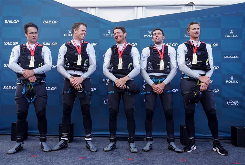 Australia SailGP Team, Ky Hurst, grinder, Sam Newton, grinder, Tom Slingsby, helmsman, Jason Waterhouse, flight controller and tactician, and Kyle Langford, wing trimmer, celebrate on the stage with their medals after winning Cowes SailGP. Cowes, Day 2, A photo copyright Bob Martin for SailGP taken at  and featuring the F50 class