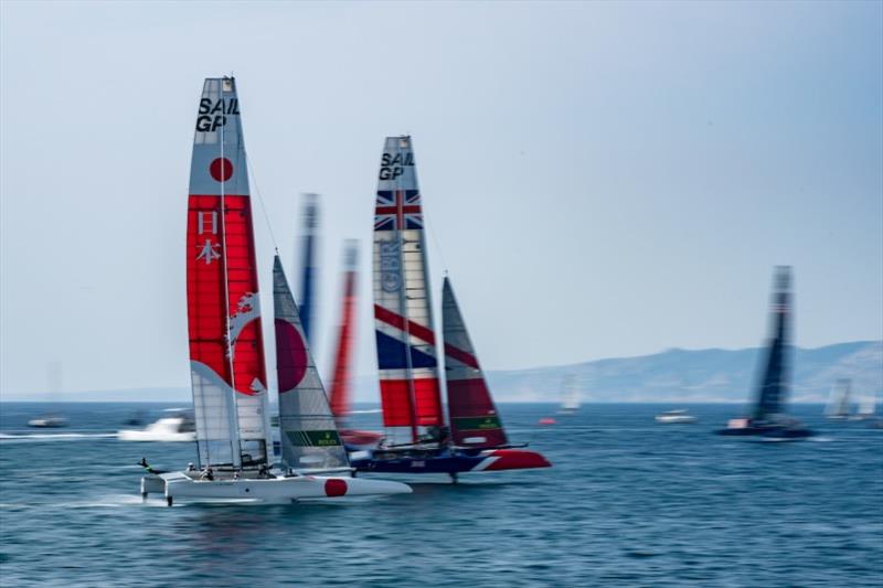 Japan SailGP Team skippered by Nathan Outteridge prepares to overtake Great Britain SailGP Team helmed by Dylan Fletcher as they compete in a practice race ahead of the final SailGP event of Season 1 in Marseille, France. - photo © Adam Warner for SailGP