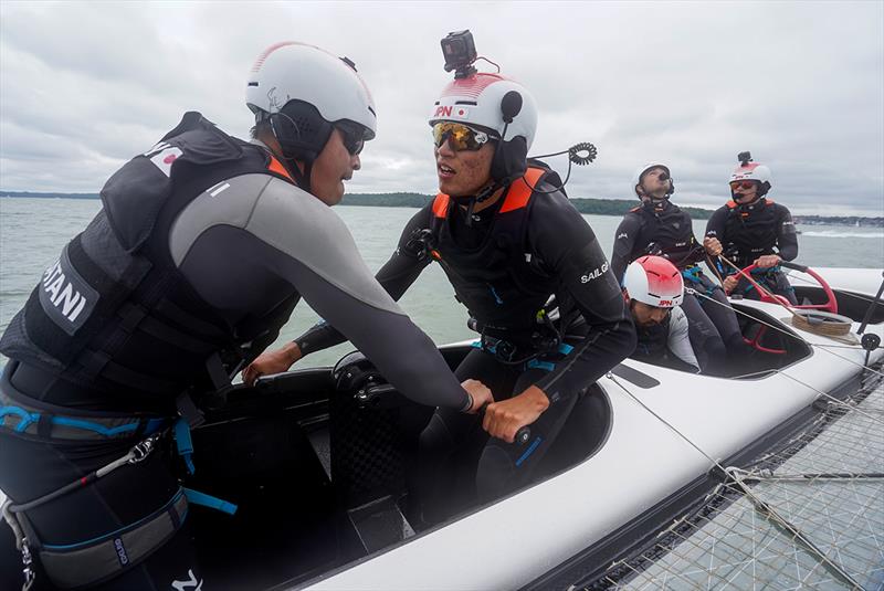 Japan SailGP Team grinders Leo Takahashi and Yuki Kasatani in action as Japan SailGP Team practise on The Solent ahead of Event 4 Season 1 SailGP event in Cowes, Isle of Wight, England, United Kingdom photo copyright Beau Outteridge for SailGP taken at  and featuring the F50 class