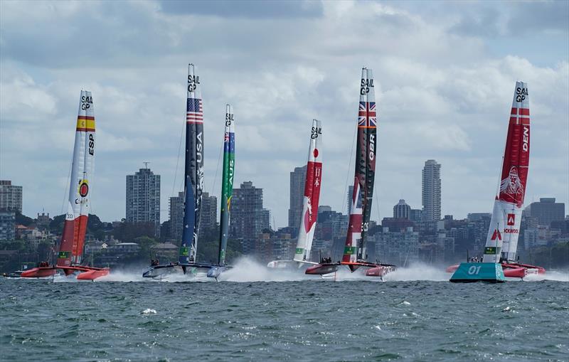 Great Britain SailGP Team helmed by Ben Ainslie leads the fleet during the first race on Race Day 1 - Sydney SailGP photo copyright Bob Martin for SailGP taken at  and featuring the F50 class
