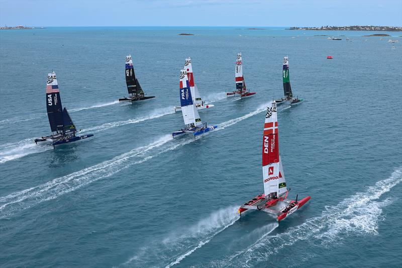The fleet being led out by Great Britain SailGP Team during Race Day 2 Bermuda SailGP  photo copyright Simon Bruty/SailGP taken at Royal Bermuda Yacht Club and featuring the F50 class