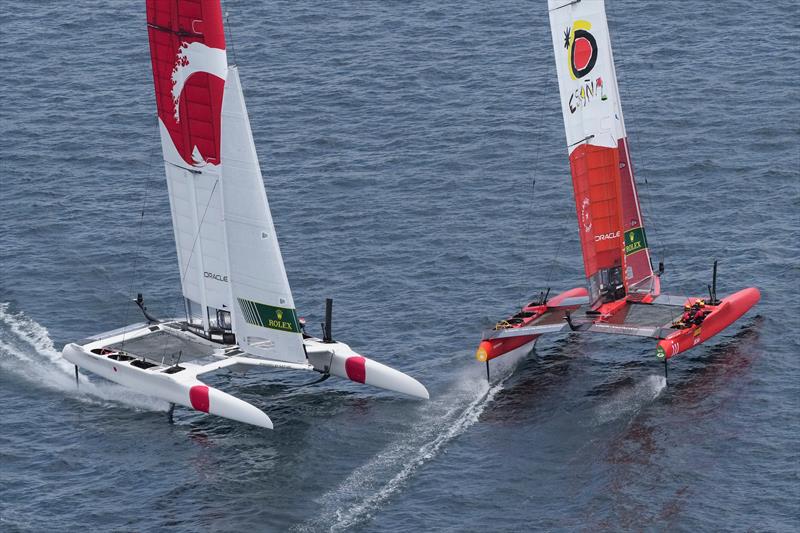 Aerial view of Japan SailGP Team helmed by Nathan Outterridge cutting behind Spain SailGP Team co-helmed by Florian Trittel and Phil Robertson in the final race on race day 2. Italy SailGP, Event 2, Season 2 in Taranto, Italy. 06 June  photo copyright Thomas Lovelock / SailGP taken at  and featuring the F50 class