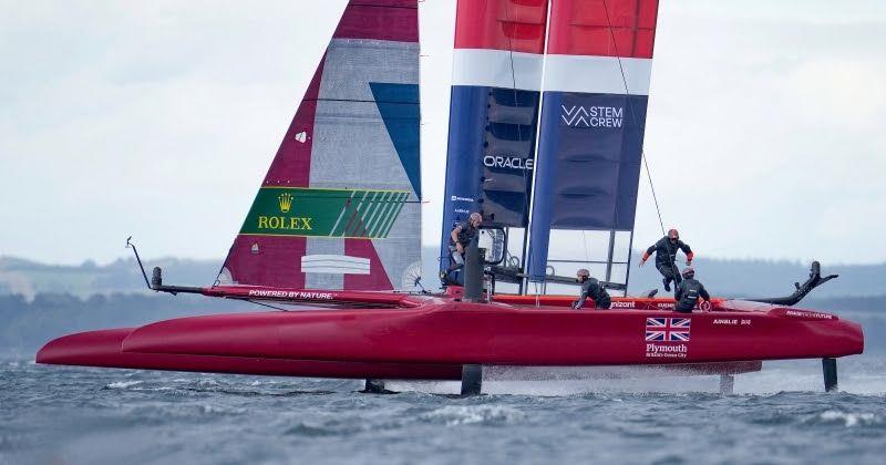 Ben Ainslie running across the Great Britain SailGP Team F50 on the Aarhus waters - photo © Thomas Lovelock for SailGP