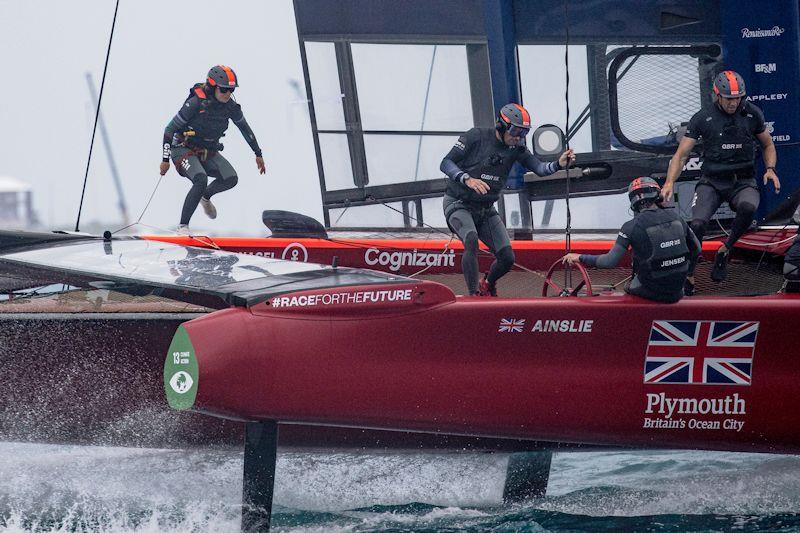 Hannah Mills of Great Britain SailGP Team runs across the F50 during a practice session photo copyright Javier Salinas for SailGP taken at  and featuring the F50 class