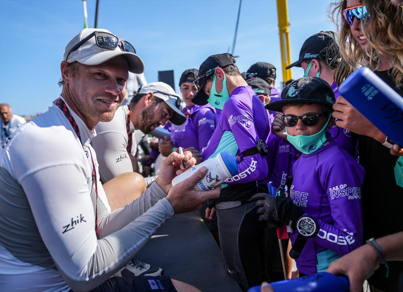 Nathan Outteridge, CEO & helmsman of Japan SailGP Team, signs autographs for the young sailors in the SailGP Inspire program after winning the final race on Race Day 2 of France SailGP photo copyright Bob Martin for SailGP taken at  and featuring the F50 class