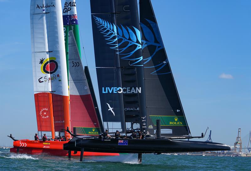 Spain SailGP Team co-helmed by Florian Trittel and Phil Robertson,  New Zealand SailGP Team co-helmed by Peter Burling and Blair Tuke in action on Race Day 1 at Spain SailGP, Event 6, Season 2 in Cadiz, Andalucia, Spain. 9th October - photo © Bob Martin/SailGP