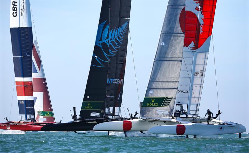 Great Britain SailGP Team helmed by Ben Ainslie, N SailGP Team helmed by Peter Burling, and Japan SailGP Team helmed by Nathan Outteridge in action Race Day 1 at Spain SailGP, photo copyright Felix Diemer/SailGP taken at  and featuring the F50 class