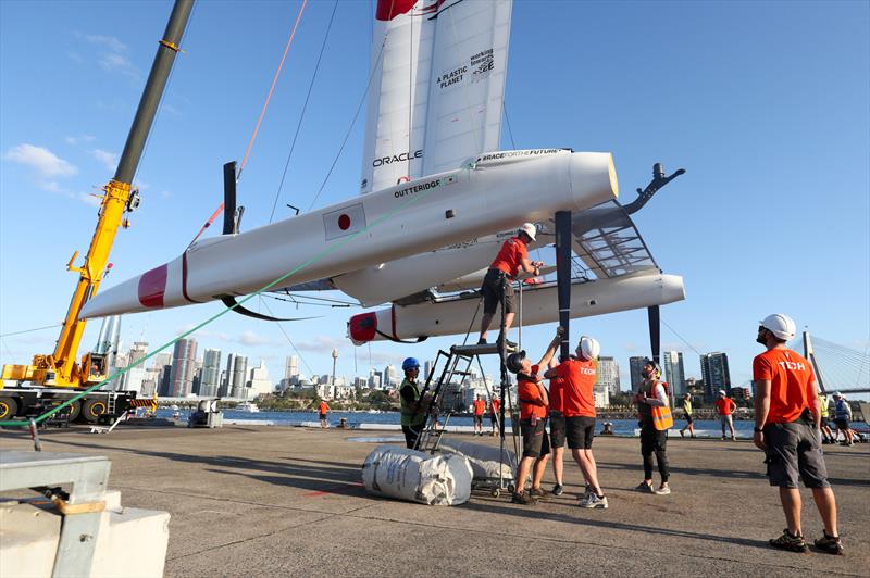 Japan SailGP Team F50 catamaran being craned out of the water at the end of Race Day 1 after colliding with Great Britain SailGP Team  photo copyright Brett Costello/SailGP taken at Woollahra Sailing Club and featuring the F50 class