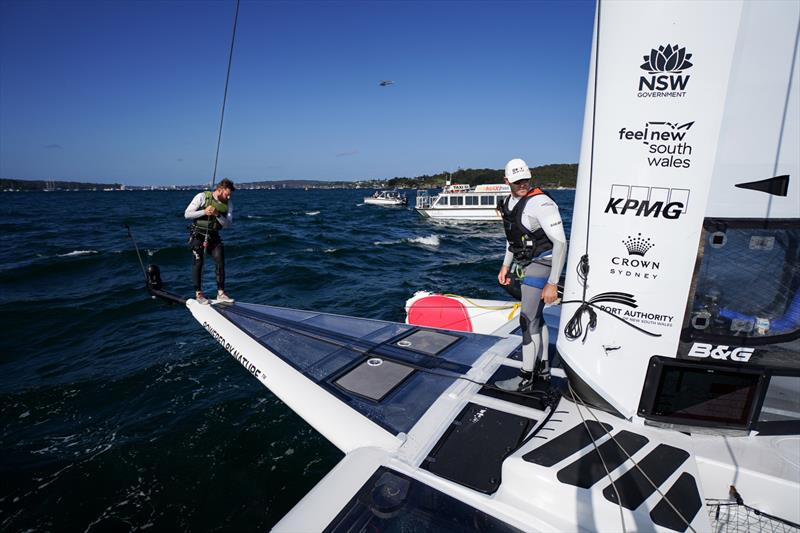 Japan SailGP Team technical crew work on the damaged bow after a collision with Great Britain SailGP Team on Race Day 1 photo copyright Beau Outteridge/SailGP taken at Woollahra Sailing Club and featuring the F50 class