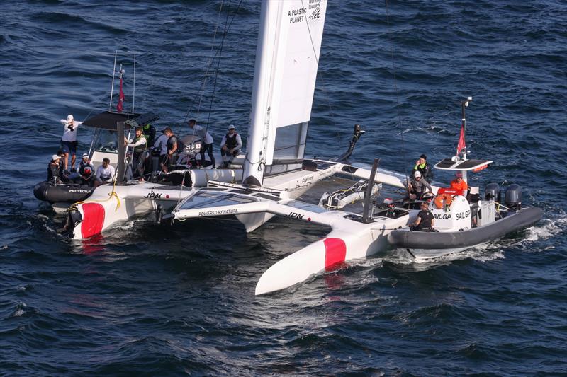 Support Boats work with Japan SailGP Team F50 catamaran after it sustained damage after a collision with Great Britain SailGP Team on Race Day 1 photo copyright David Gray/SailGP taken at Woollahra Sailing Club and featuring the F50 class